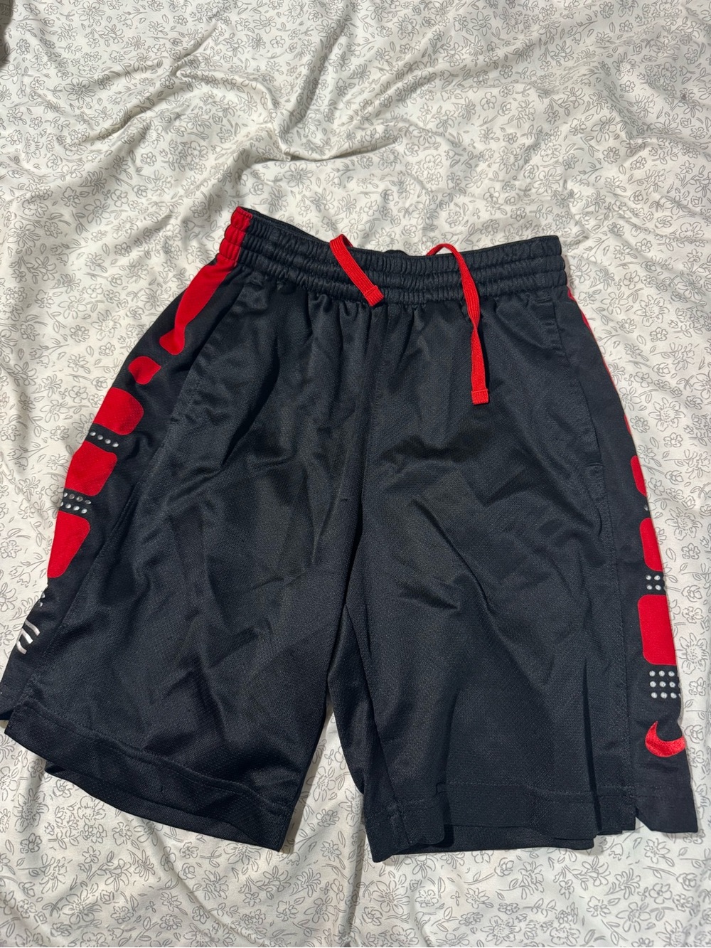 Nike Black Athletic Mesh Shorts with Red Accents